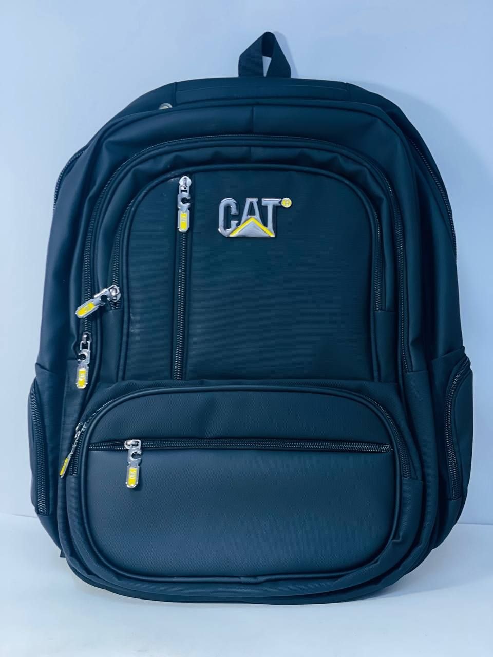 شنطة ظهر لاب توب CAT مقاومة للماء بـ 9 سوستة ومخرج USB